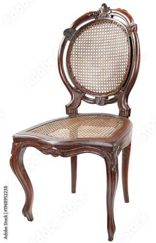 Elegant vintage wooden chair featuring a classic oval cane back, intricate hand-carved floral details, and graceful cabriole legs. A timeless piece of antique furniture with a rich mahogany finish.