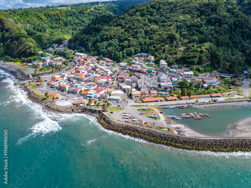 aerial landscape view of area around Grand'Rivière, a village and commune in the French overseas department of Martinique, located at Islands most northern tip, green hilly landscape in the background