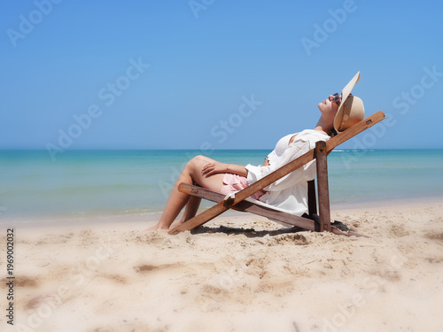 happy young woman on the beach
