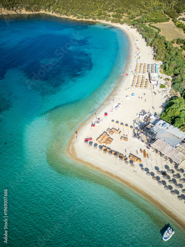 Abstract aerial of turquoise ocean on beach