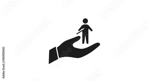 Hand holding a small human figure.