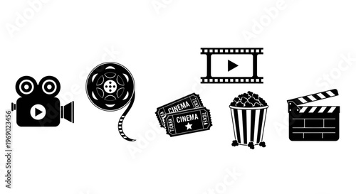 Film making equipment arranged on a table indoors with movie camera