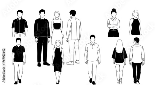 A group of people standing together in various poses and outfits indoors.