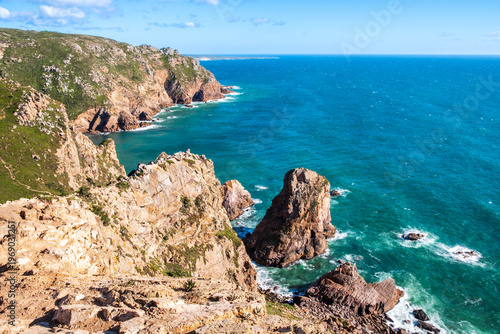 Cabo da Roca, Portugal near Sintra, Lisbon district. Dramatic cliffs in Atlantic ocean. Most western point of Europe. Beautiful seascape with rugged coast