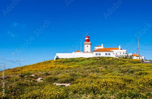 Cabo da Roca lighthouse in Sintra, Lisbon district, Portugal. Most western point of continental Europe. Beautiful seascape on sunny day