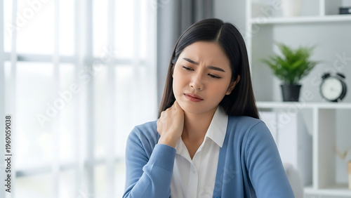 Woman Experiencing Neck Pain While Working at Home Office, Indoor Setting, Focused Perspective, Lifestyle Concept Free Download Woman Experiencing Neck Pain While Working at Home Office, Indoor Setting, Focused Perspective, Lifestyle Concept - GFXLoad