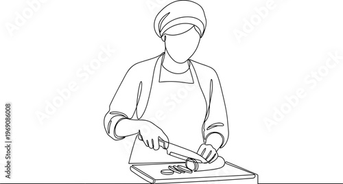 Chef cutting food on a board.