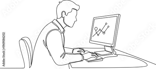 Man sitting at desk with computer.