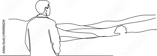 Man sitting on edge of cliff.