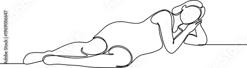 Woman lying down on side relaxed.