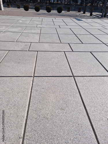 It is a marble sidewalk block floor.