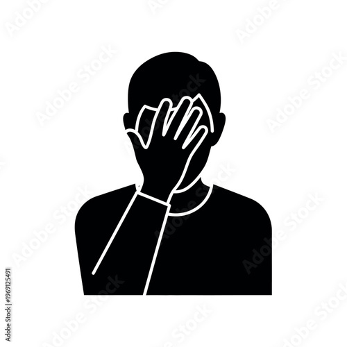 Man covering face with hand in shame or embarrassment.