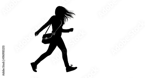 Silhouette of a Woman Walking with a Bag in Black and White.