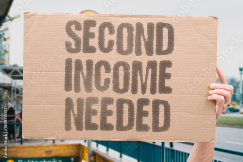 фотографія "Second Income Needed" A second income source is now essential for many average working adults globally