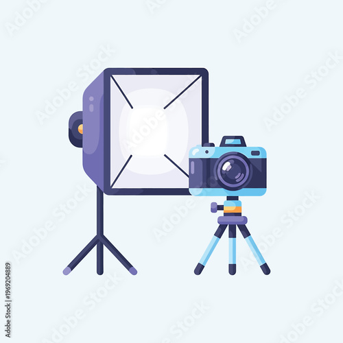 Camera on tripod with softbox light.