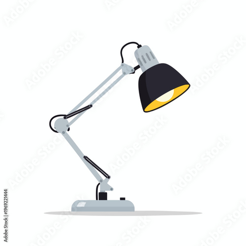 An adjustable silver desk lamp with a black shade and a lit yellow bulb