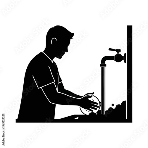 Silhouette of person washing dishes under running water from faucet