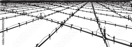 Barbed wire fence in a grid pattern closeup view