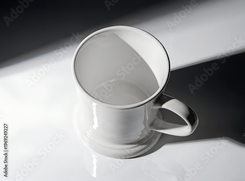 Blank White Ceramic Coffee Mug Mockup: Top View of Empty Porcelain Cup with Dramatic Sunlight Shadows Isolated on White