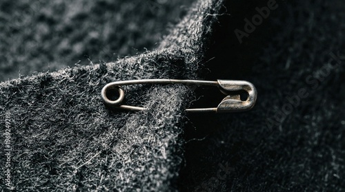 A close up of a piece of cloth with a metal ring
