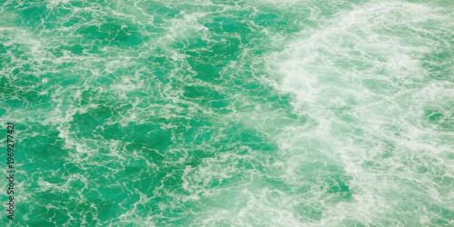 Photography Abstract a mesmerizing aerial perspective of cascading turquoise ocean water, with a swirling pattern
