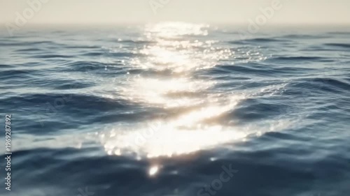 Serene Ocean Waves Reflecting Sunlight at Dusk