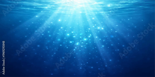 Abstract the image embodies the mystique of the ocean's depths, capturing the sun's radiant rays filtering down to create a luminous spectacle. The dance of light illuminates a world of tranquility. 