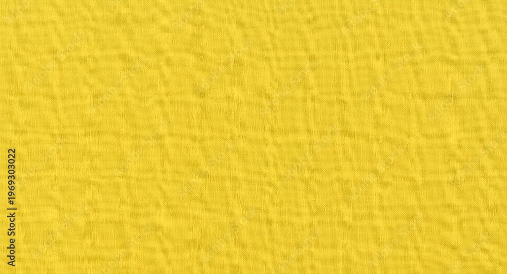Obraz premium yellow cotton linen fabric texture backdrop featuring natural weave and light shadow