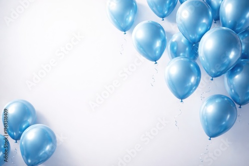 Glossy blue balloons floating on a smooth light background with copy space