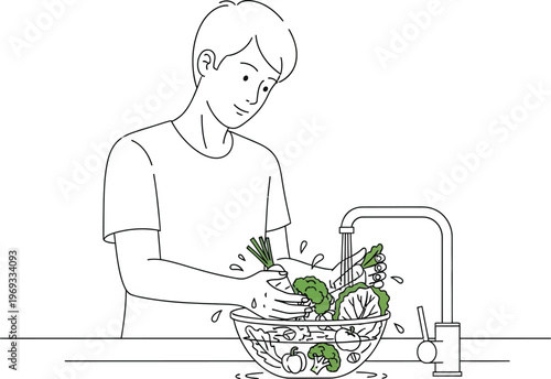 Man washing vegetables in a kitchen sink with a bowl