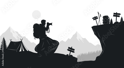 Silhouette of a photographer taking pictures on a mountain peak