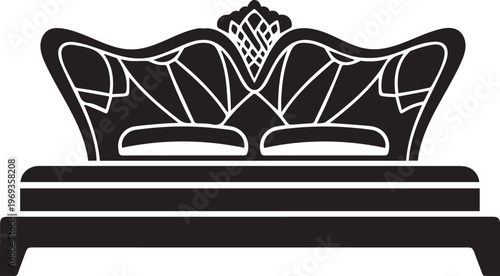 A dark silhouette of an ornate, decorative empty bed frame featuring a headboard.