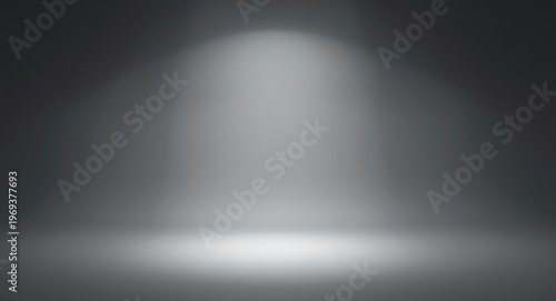 Studio room background in soft gray with floor highlighted by spotlight