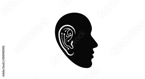 Human silhouette with intricate circuits inside the ear, symbolizing hearing technology and innovation.