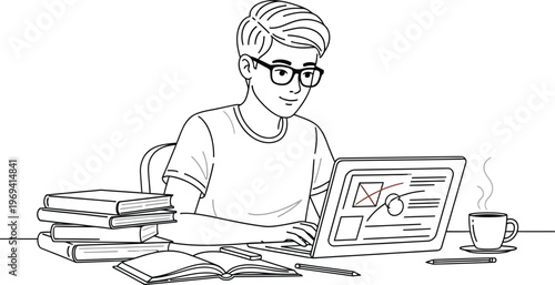 Young man studying with books and laptop at a desk