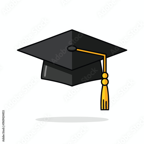 Black graduation cap with a yellow tassel and a shadow underneath
