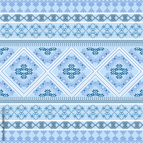 Blue and white knitted ethnic boho seamless pattern. Patchwork texture. Weaving. Pixel vector pattern. Cross-stitch vector seamless pattern. Wallpaper, textiles, and elaborate borders.
