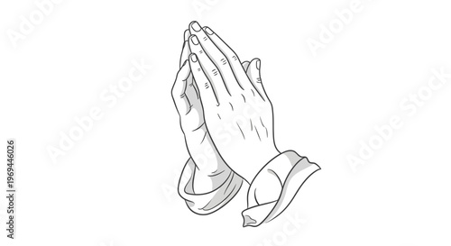 Golden hands clasped in prayer sculpture against a blurred background