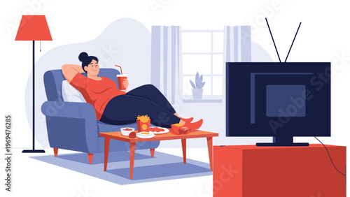 Plus size woman relaxing on a comfortable armchair at home while watching television and eating fast food and unhealthy snacks.