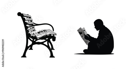 Silhouette of a person reading a newspaper on the ground next to an empty park bench.