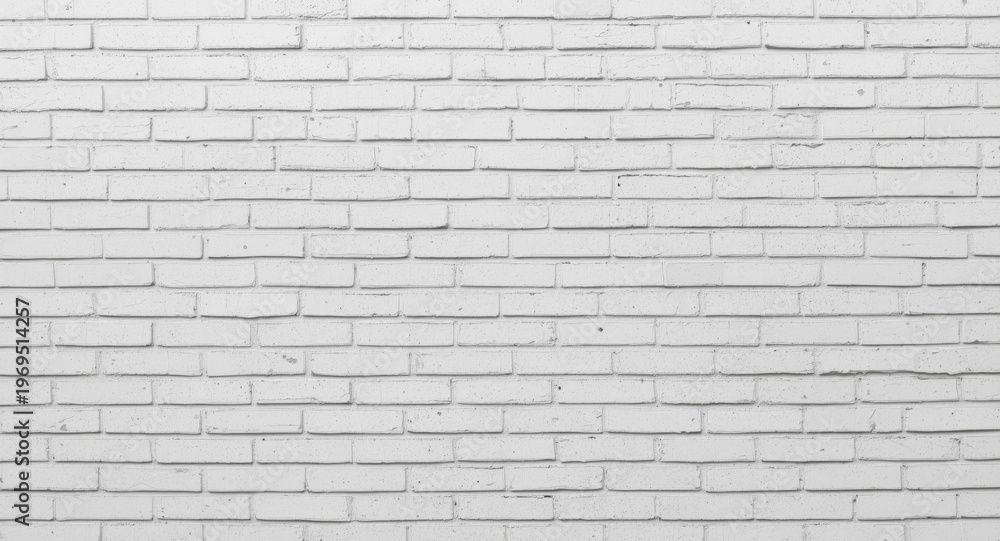 Fototapeta premium White brick wall background featuring blank copy space for template
