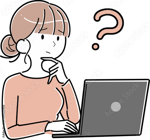 パソコンの前で首をかしげて疑問を持つ女性