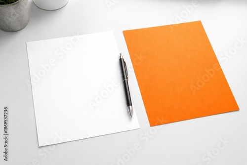 White paper sheet and pen b...