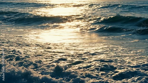 Wallpaper Mural Ocean wave breaking with golden sunlight reflecting on water Torontodigital.ca