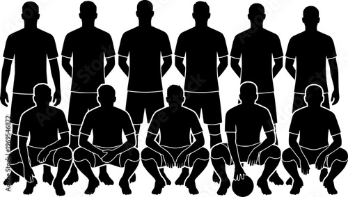 Soccer team standing in formation ready to play with ball