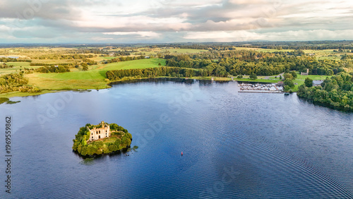 Schilderij op canvas Aerial drone view of McDermotts Castle on small island in Lough Key lake, county