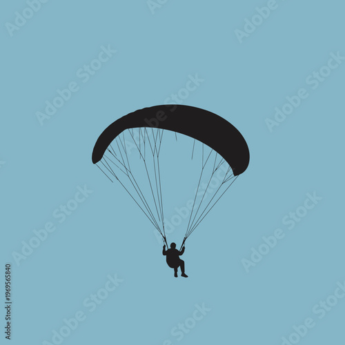 Person paragliding in the air sports.