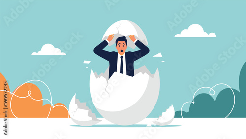 Surprised businessman hatching out of a large cracked white egg shell representing a new beginning or birth of a career.