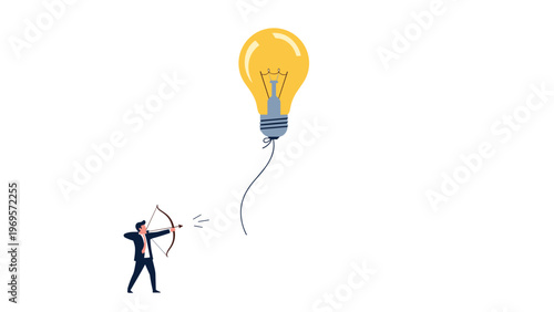 Businessman aiming a bow and arrow at a large yellow lightbulb idea balloon floating in the air representing targeting new concepts.