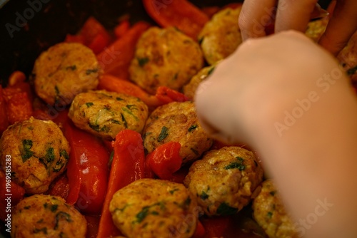 Moroccan Fish Patties Frying in Pan During Passover Holiday Traditional Homemade Cooking Process Close Up of Fish Balls in Oil